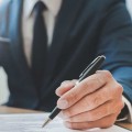 What are the five essential elements of a valid real estate contract?